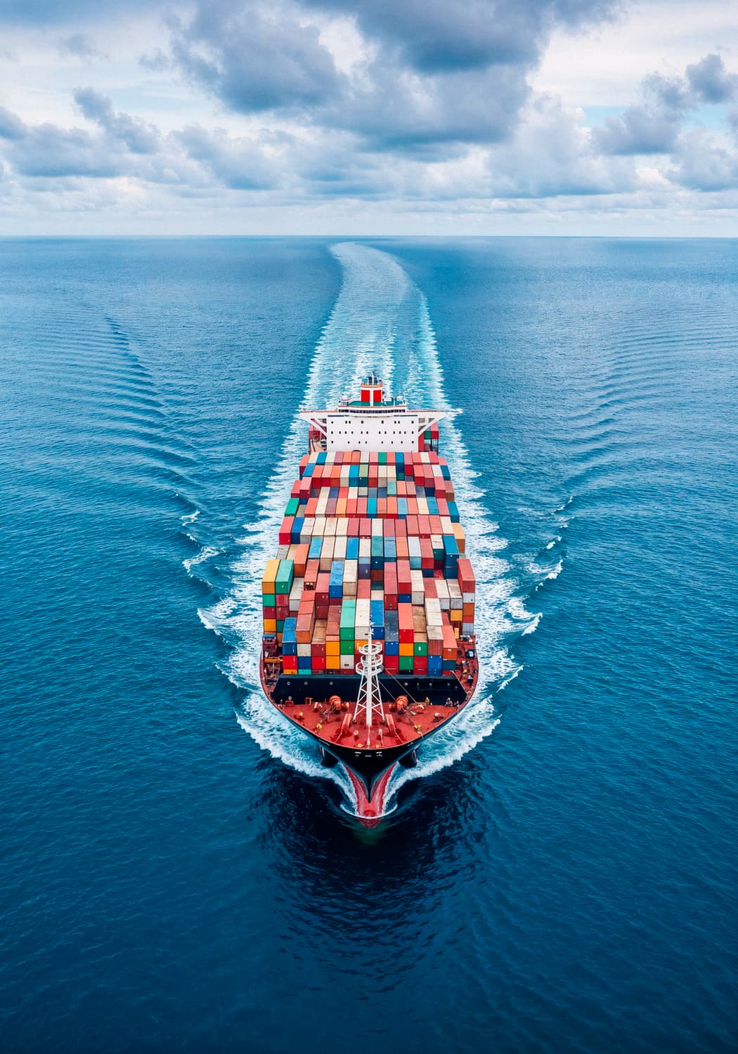 Aerial top view of industrial cargo container ship